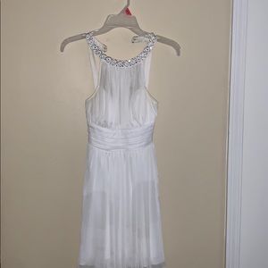 A short homecoming/ prom dress